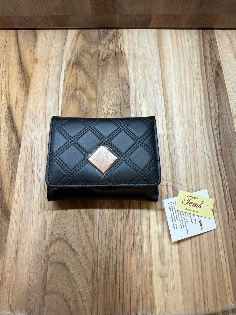 Quilted Black Leather Mini Wallet with Square Gold Emblem